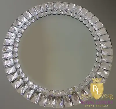 Mirrored round charger with a double ring of faceted clear jewels around the rim