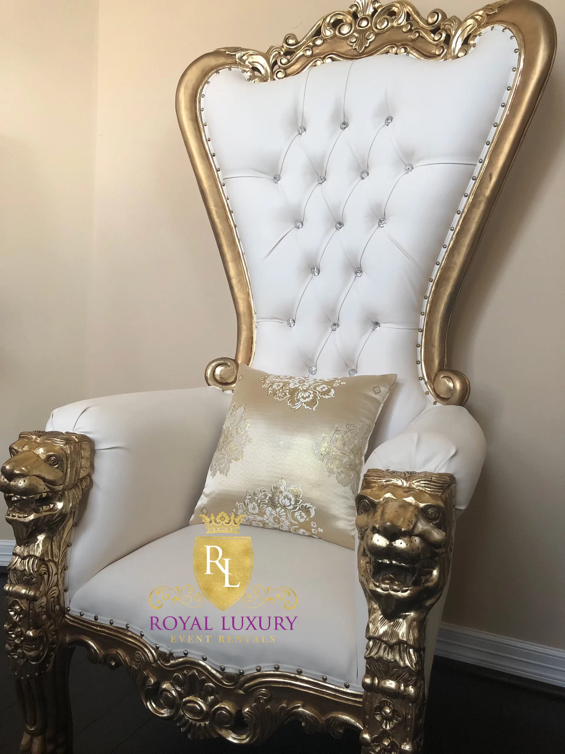 https://royalluxuryevents.com/wp-content/uploads/2022/10/Royal-Lion-Gold-Throne-Chair-with-Ivory-Leather_5-scaled.webp