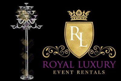 Tall clear crystal floor candelabra with tiered curved arms and a round faceted base, shown on a black background