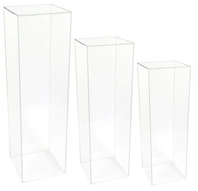 Set of three clear acrylic square display columns in graduated heights