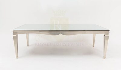 Rectangular dining table with polished silver frame, tapered legs and mirror glass top