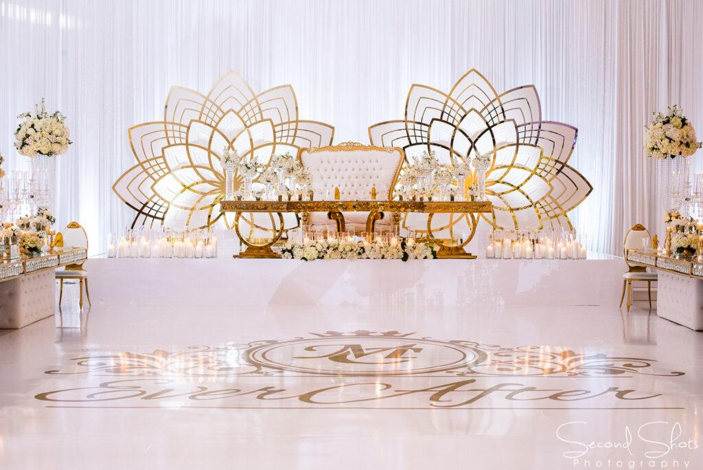 white and gold wedding decor - royal luxury events - rentals - flowers - gold chairs - fancy chairs