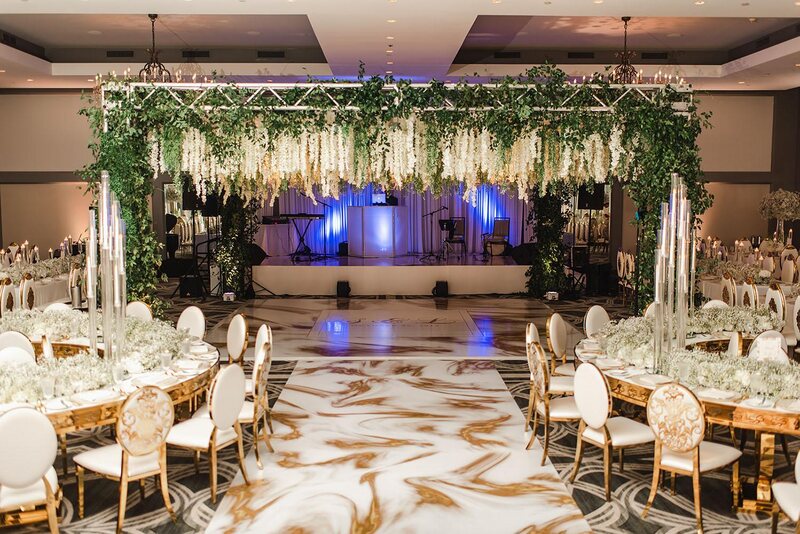 Wisteria, Baby's Breath, reception decor, omni houston, wedding decor, florist in houston, gold round table