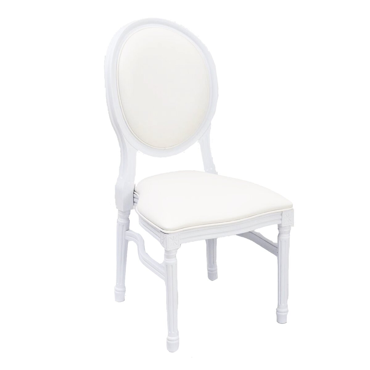 White Louis XVI dining chair with oval cushioned back, fluted legs and carved rosette corners