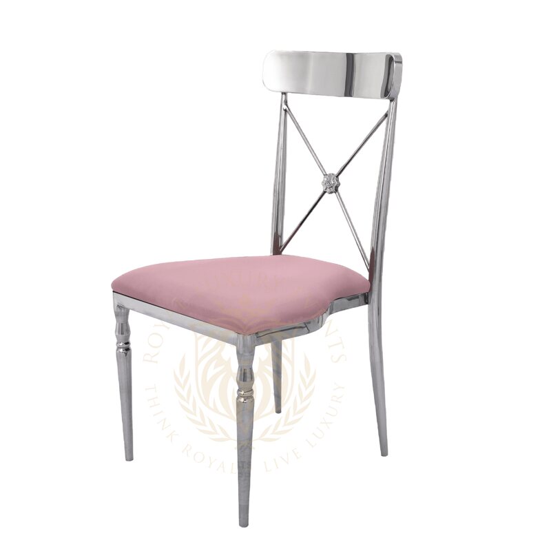 Cross-back chair with polished silver frame and blush pink velvet seat