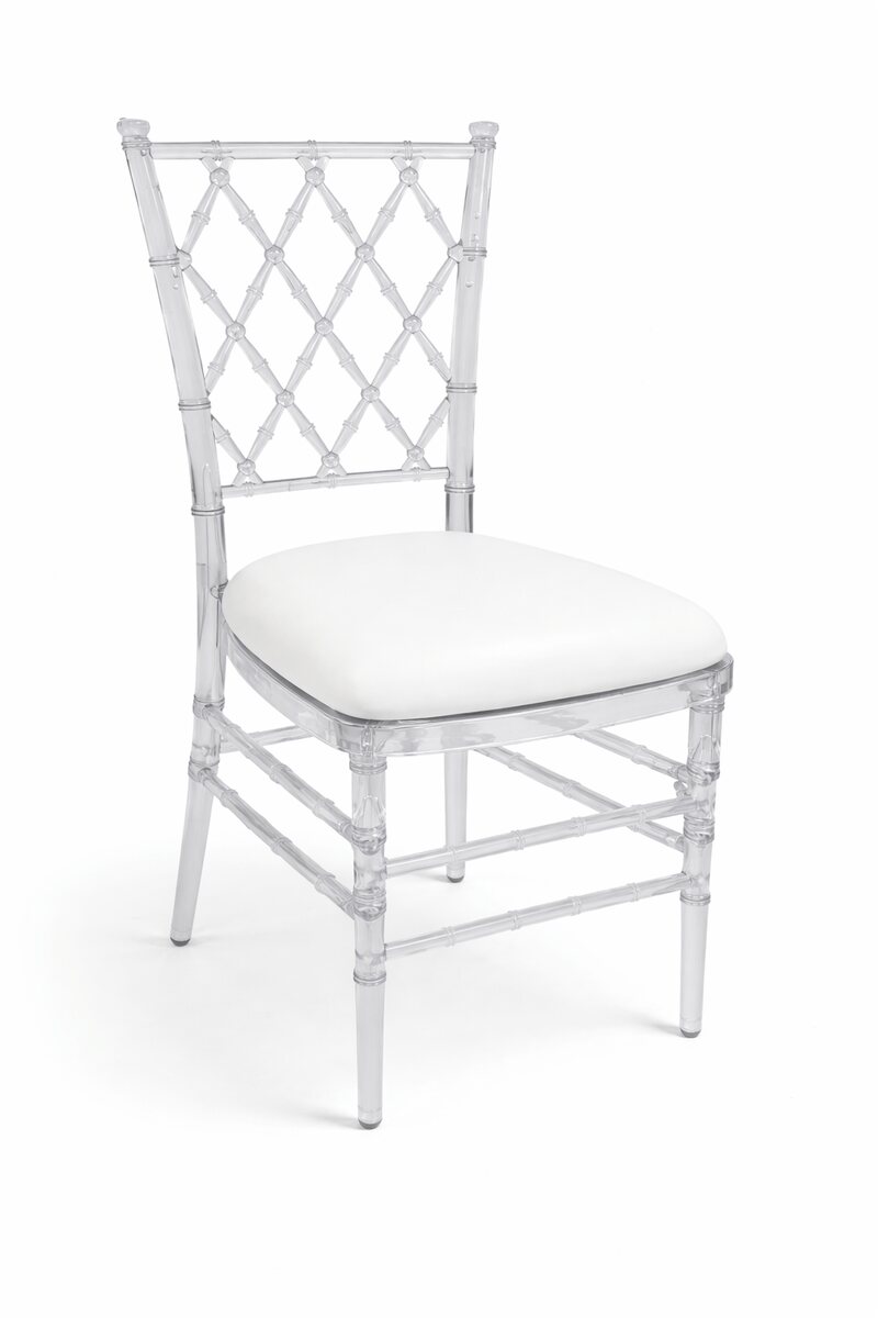 Clear ghost chair with diamond lattice back and white leather cushion, shown at a three-quarter angle