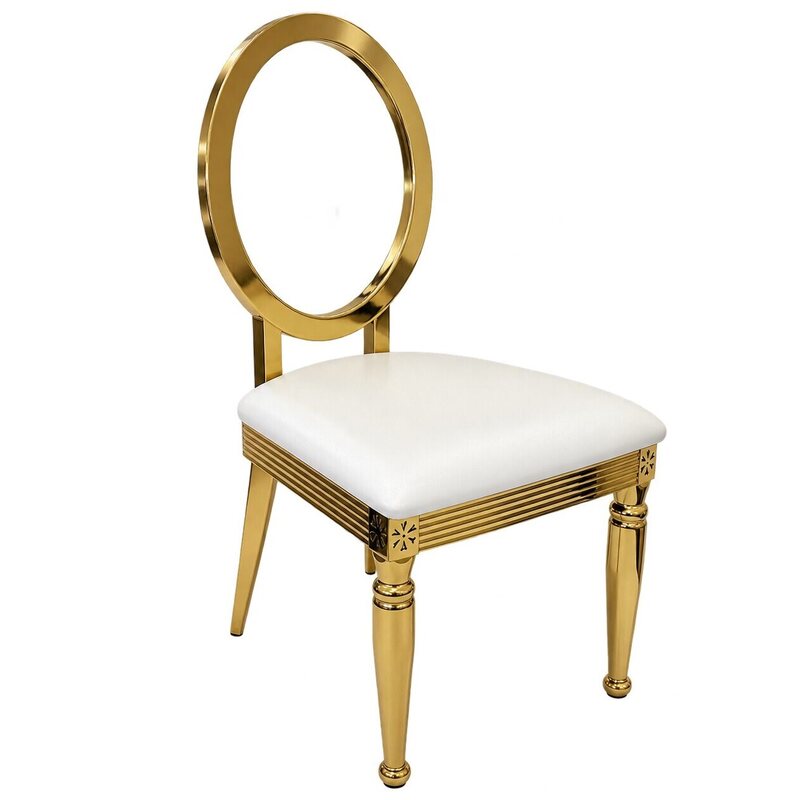 Gold dining chair with round clear acrylic back and white cushion, seen from a three-quarter angle in a showroom