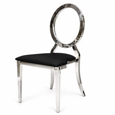 Silver dining chair with black cushion and round polished steel back, shown at an angle from the side