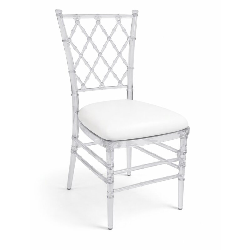 Clear ghost chair with diamond lattice back and white leather cushion, shown at a three-quarter angle