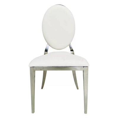 Silver Garbo dining chair with oval white velvet backrest and seat, shown from the front